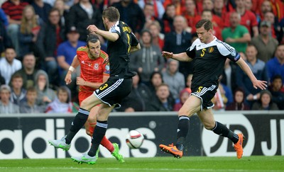 120615 - Wales v Belgium - UEFA European Championship 2016 Qualifier -Gareth Bale of Wales crosses the ball