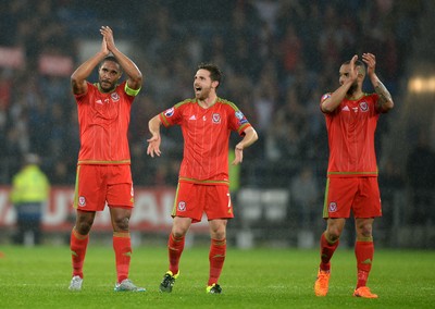 120615 - Wales v Belgium - UEFA European Championship 2016 Qualifier -Ashley Williams, Joe Allen and Ashley Richards of Wales celebrate