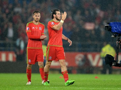 120615 - Wales v Belgium - UEFA European Championship 2016 Qualifier -Gareth Bale of Wales calls players in for a huddle