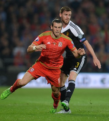 120615 - Wales v Belgium - UEFA European Championship 2016 Qualifier -Gareth Bale of Wales and Nicolas Lombaerts of Belgium collide