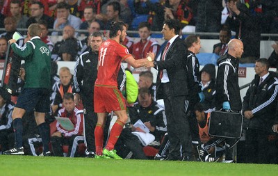 120615 - Wales v Belgium - UEFA European Championship 2016 Qualifier -Gareth Bale of Wales shakes hands with manager Chris Coleman