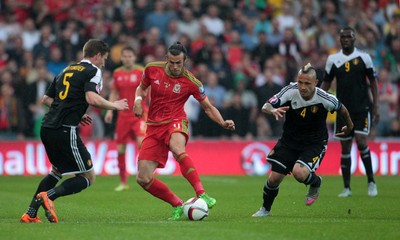 120615 - Wales v Belgium - UEFA European Qualifier - Gareth Bale of Wales goes past Jan Vertonghen of Belgium