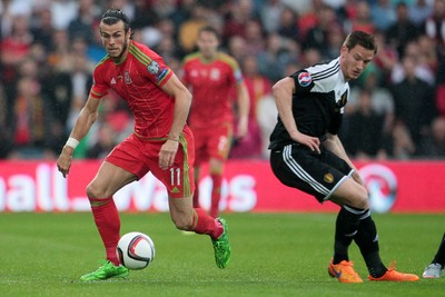 120615 - Wales v Belgium - UEFA European Qualifier - Gareth Bale of Wales goes past Jan Vertonghen of Belgium