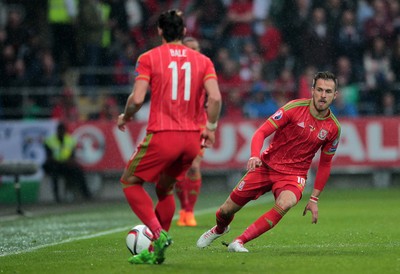 120615 - Wales v Belgium - UEFA European Qualifier - Aaron Ramsey passes to Gareth Bale of Wales