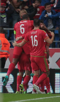 120615 - Wales v Belgium - UEFA European Qualifier - Gareth Bale of Wales and team mates celebrate their first goal