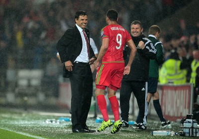 120615 - Wales v Belgium - UEFA European Qualifier - Wales manager Chris Coleman celebrates at full time with Hal Robson-Kanu of Wales