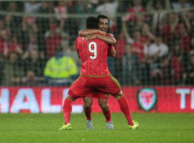 120615 - Wales v Belgium - UEFA European Qualifier - Hal Robson-Kanu celebrates with Neil Taylor of Wales