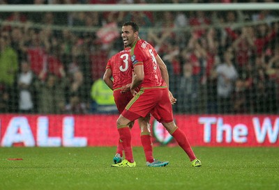 120615 - Wales v Belgium - UEFA European Qualifier - Hal Robson-Kanu celebrates with Neil Taylor of Wales