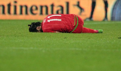 120615 - Wales v Belgium - UEFA European Qualifier - Gareth Bale of Wales goes down injured