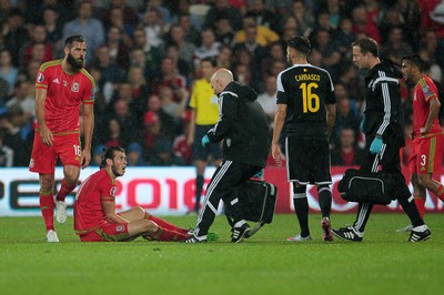 120615 - Wales v Belgium - UEFA European Qualifier - Gareth Bale of Wales is seen by medics
