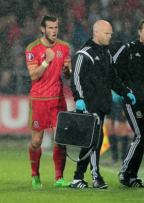 120615 - Wales v Belgium - UEFA European Qualifier - Gareth Bale of Wales goes off injured