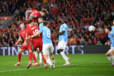 131025 - Wales v Belgium - 2026 FIFA World Cup Qualifying - Joe Rodon of Wales scores the first goal of the game