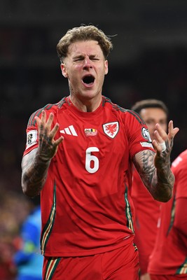 131025 - Wales v Belgium - 2026 FIFA World Cup Qualifying - Joe Rodon of Wales celebrates scoring a goal