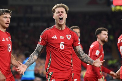 131025 - Wales v Belgium - 2026 FIFA World Cup Qualifying - Joe Rodon of Wales celebrates scoring a goal