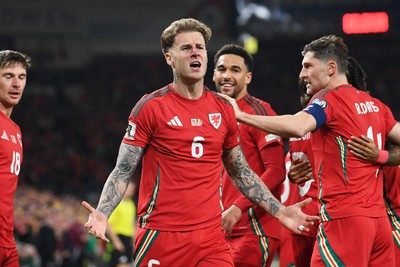 131025 - Wales v Belgium - 2026 FIFA World Cup Qualifying - Joe Rodon of Wales celebrates scoring a goal