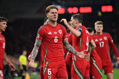131025 - Wales v Belgium - 2026 FIFA World Cup Qualifying - Joe Rodon of Wales celebrates scoring a goal