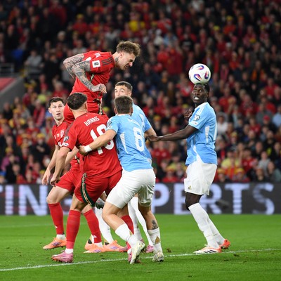131025 - Wales v Belgium - 2026 FIFA World Cup Qualifying - Joe Rodon of Wales heads home  after he scores the first goal of the game