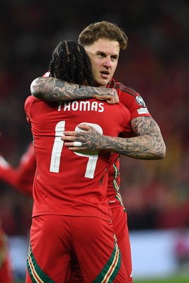 131025 - Wales v Belgium - 2026 FIFA World Cup Qualifying - Joe Rodon of Wales celebrates scoring a goal with team mates