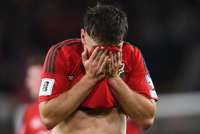 131025 - Wales v Belgium - 2026 FIFA World Cup Qualifying - Dejected Mark Harris of Wales