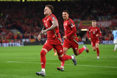 131025 - Wales v Belgium - 2026 FIFA World Cup Qualifying - Joe Rodon of Wales celebrates scoring a goal