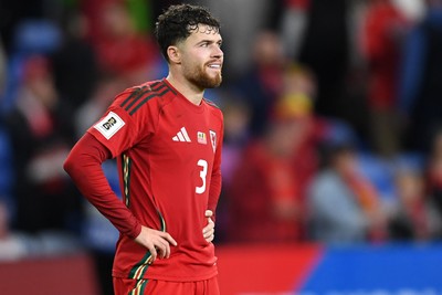 131025 - Wales v Belgium - 2026 FIFA World Cup Qualifying - Dejected Neco Williams of Wales
