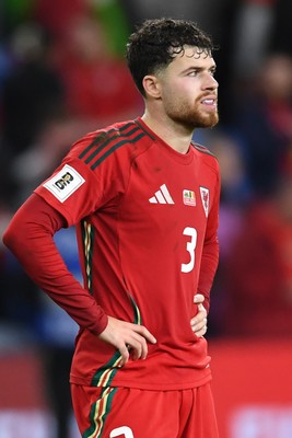 131025 - Wales v Belgium - 2026 FIFA World Cup Qualifying - Dejected Neco Williams of Wales