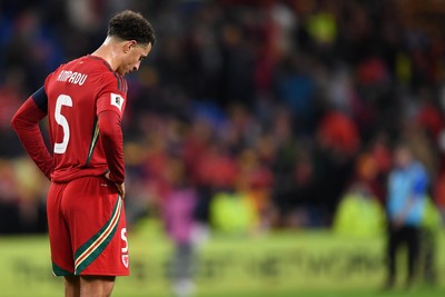 131025 - Wales v Belgium - 2026 FIFA World Cup Qualifying - Dejected Ethan Ampadu of Wales