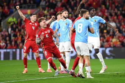 131025 - Wales v Belgium - 2026 FIFA World Cup Qualifying - Joe Rodon of Wales celebrates scoring the first goal of the game