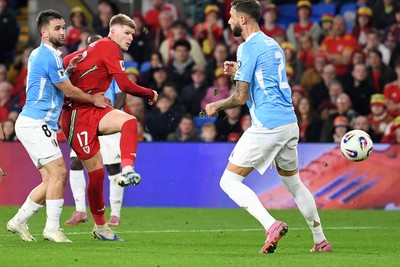 131025 - Wales v Belgium - 2026 FIFA World Cup Qualifying - Jordan James of Wales is challenged by Nicolas Raskin of Belgium