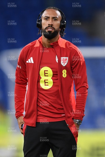 131025 - Wales v Belgium - 2026 FIFA World Cup Qualifying - Sorba Thomas of Wales arrives and inspects the pitch ahead of the match