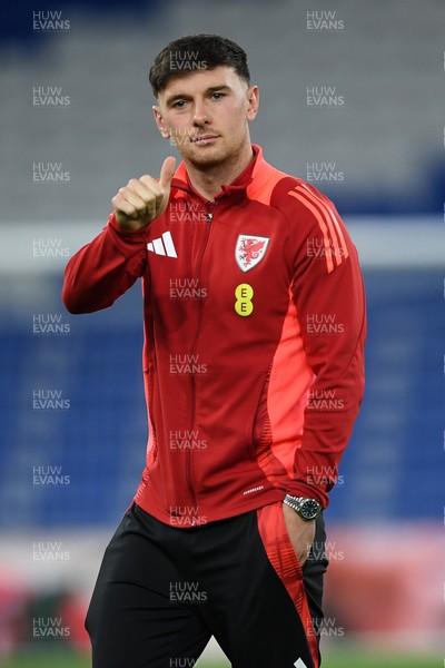 131025 - Wales v Belgium - 2026 FIFA World Cup Qualifying - Mark Harris of Wales arrives and inspects the pitch ahead of the match