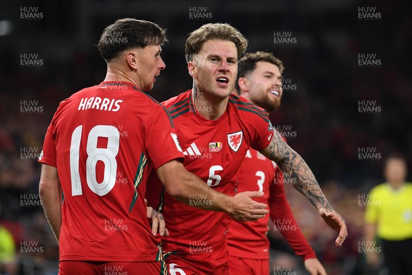 131025 - Wales v Belgium - 2026 FIFA World Cup Qualifying - Joe Rodon of Wales celebrates scoring a goal with team mates