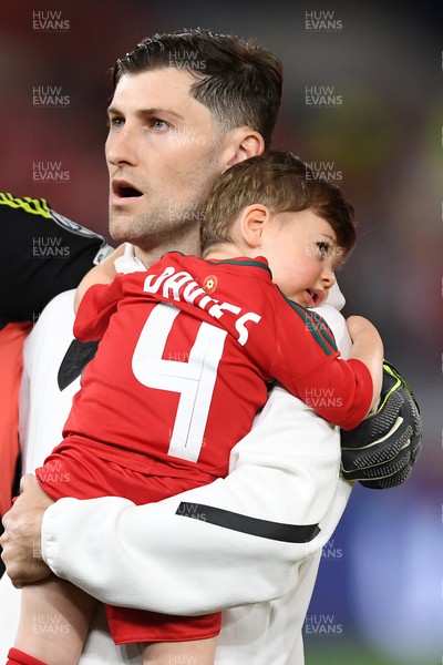 131025 - Wales v Belgium - 2026 FIFA World Cup Qualifying - Ben Davies of Wales during the anthem on his 100th cap