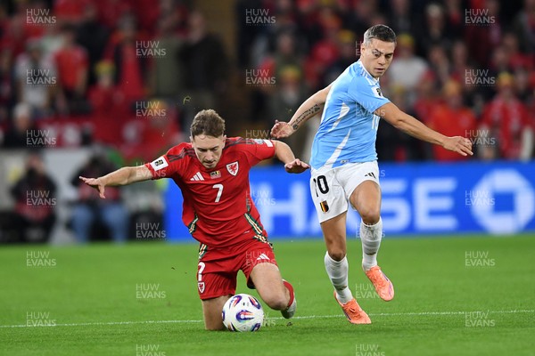 131025 - Wales v Belgium - 2026 FIFA World Cup Qualifying - David Brooks of Wales is challenged by Leandro Trossard of Belgium
