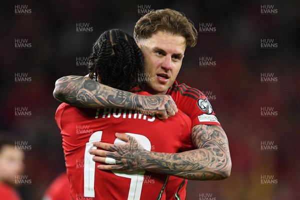 131025 - Wales v Belgium - 2026 FIFA World Cup Qualifying - Joe Rodon of Wales celebrates scoring a goal with team mates