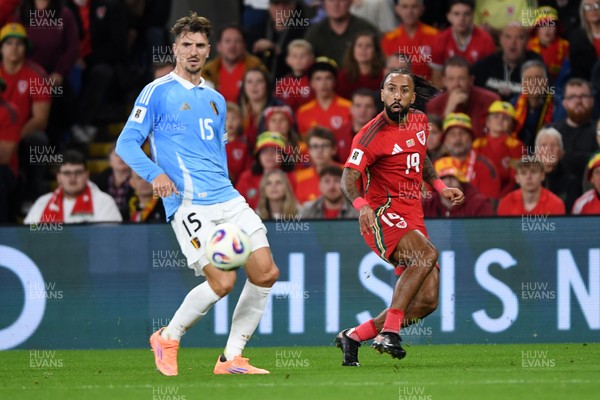 131025 - Wales v Belgium - 2026 FIFA World Cup Qualifying - Sorba Thomas of Wales puts a cross into the box