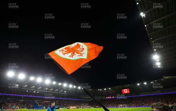 161121 - Wales v Belgium, 2022 World Cup Qualifier - A Wales flag is waved as the players come out for the start of the match