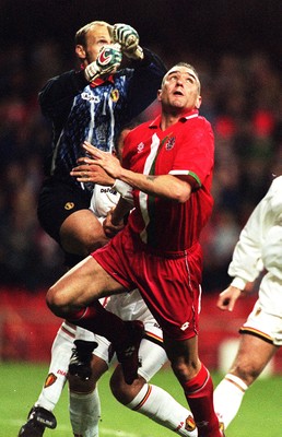 290397 - Wales v Belgium - FIFA World Cup Qualifier -  Vinnie Jones takes on keeper De Wilde