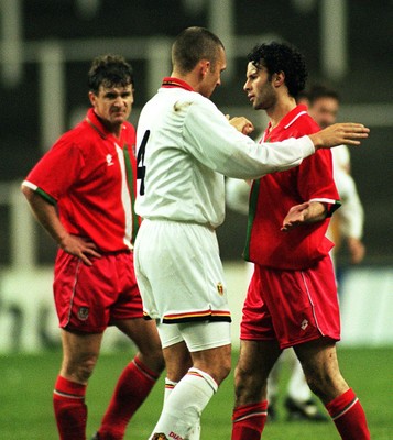 290397 - Wales v Belgium - FIFA World Cup Qualifier -  Disappointed Ryan Giggs is consoled by Eric van Meir