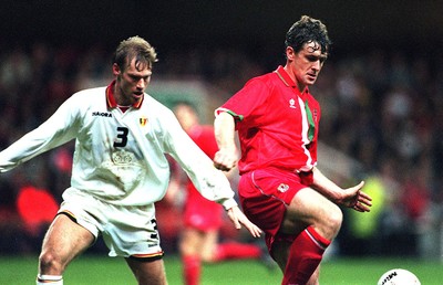 290397 - Wales v Belgium - FIFA World Cup Qualifier -  Mark Hughes gets the better of Albert De Roover