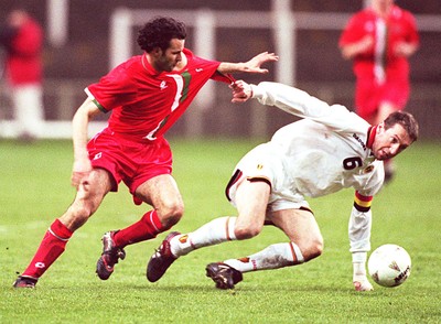 290397 - Wales v Belgium - FIFA World Cup Qualifier -  Ryan Giggs is tackled by Franky van der Elst