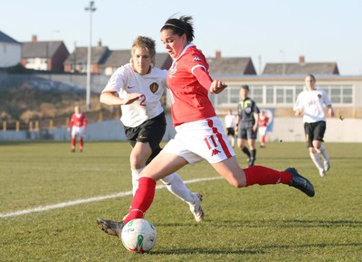 17.02.08.. Wales v Belgium, UEFA Women's Championship 2009.Jenner Park, Barry Wales' Gwennan Harries goes past Belgium's Maud Coutereels 