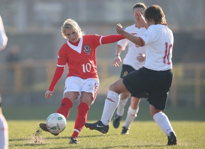 17.02.08.. Wales v Belgium, UEFA Women's Championship 2009.Jenner Park, Barry Wales' Jessica Fishlock plays the ball past Nikki De Cock 