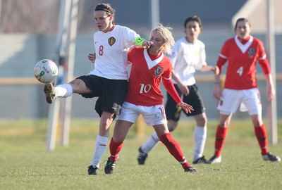 17.02.08.. Wales v Belgium, UEFA Women's Championship 2009.Jenner Park, Barry Belgium's Femke Maes is put under pressure by Wales' Jessica Fishlock 