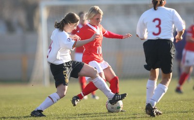17.02.08.. Wales v Belgium, UEFA Women's Championship 2009.Jenner Park, Barry Wales' Jessica Fishlock tangles with Belgium's Hanne Vandegoor 