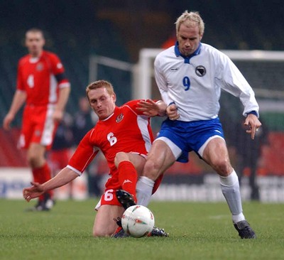 120203 - Wales v Bosnia-Herzegovina - International friendly - Wales' Mark Pembridge tackles Sergej Barbarez