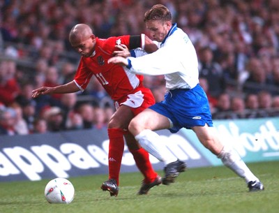 120203 - Wales v Bosnia-Herzegovina - International friendly - Wales' Robert Earnshaw gets past Kenan Hasagic