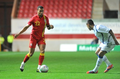 150812 - Wales v Bosnia Herzegovina, Vauxhall International Friendly -   Hal Robson - Kanu of Wales, left, takes on  Emir Spahic of Bosnia Herzegovina   