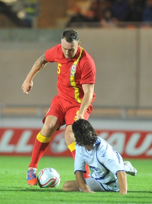 150812 - Wales v Bosnia Herzegovina, Vauxhall International Friendly -   Darcy Blake of Wales, left, compete's for the ball with Adnan Zahirovic  of Bosnia Herzegovina   
