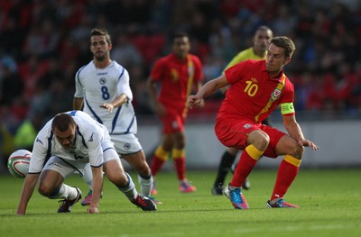 150812 - Wales v Bosnia Herzegovina, Vauxhall International Friendly - Wales' Aaron Ramsey loses possession